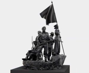 Bronze sculpture of diverse soldiers in uniform holding a flag and rifles on a rocky base.