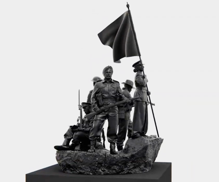 Bronze sculpture of diverse soldiers in uniform holding a flag and rifles on a rocky base.