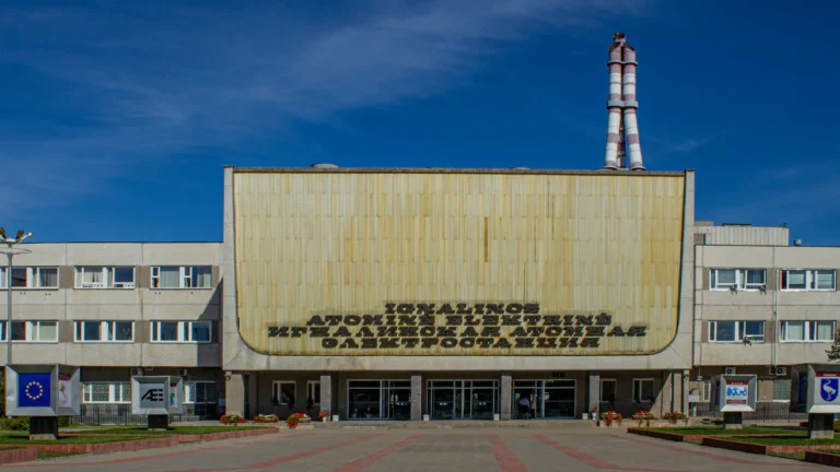 The main entrance to the Ignalina Nuclear Power Plant in Lithuania with clear blue sky.