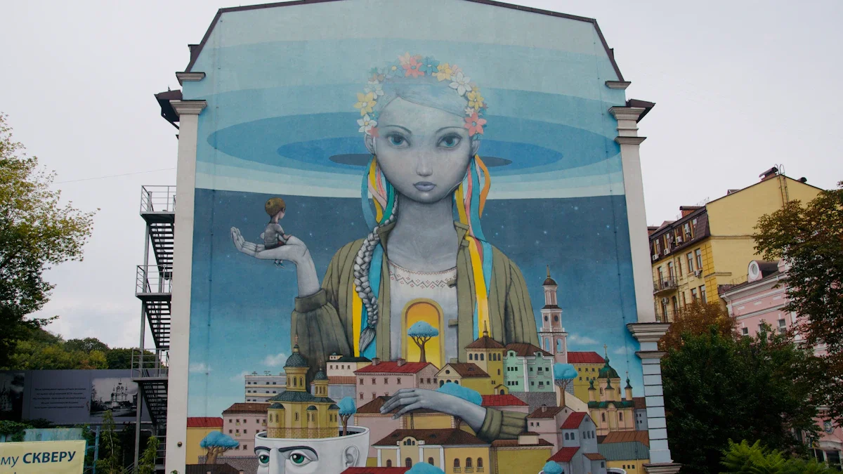 A massive blue mural of a figure with a flower crown overlooking a painted cityscape.