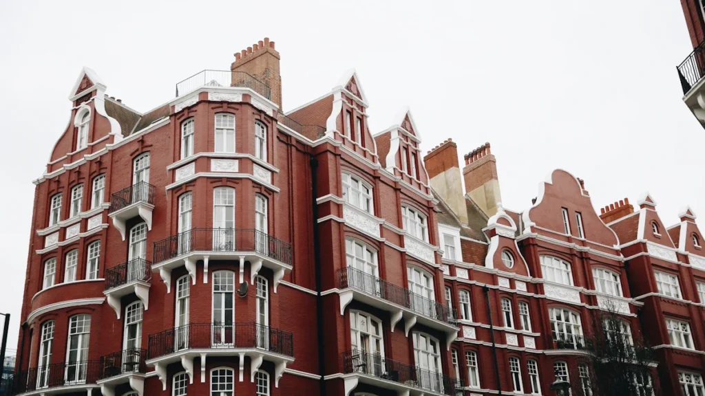 A large red brick residential building with white trim and multiple stories, representative of St Stephen’s House.