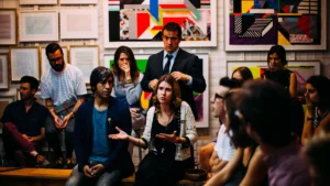 A diverse group of people engaged in a lively discussion during a community review panel meeting.
