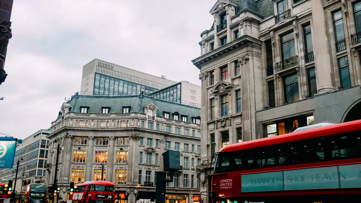Iconic red London bus at Oxford Circus with historic architecture and urban traffic.