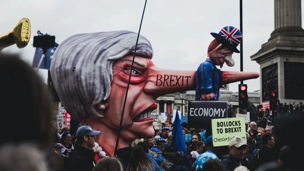 A large political puppet at a mass protest in central London.
