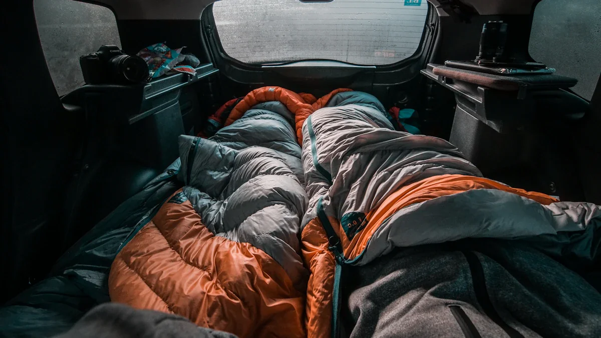 Sleeping bags arranged inside a car representing emergency accommodation and temporary shelter.
