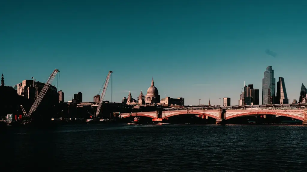 Aerial view of the River Thames, London, featuring bridges and city skyline.
