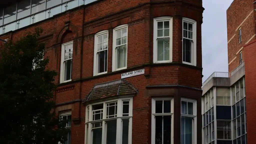 Classic red brick architecture on Rutland Street in Leicester, UK.